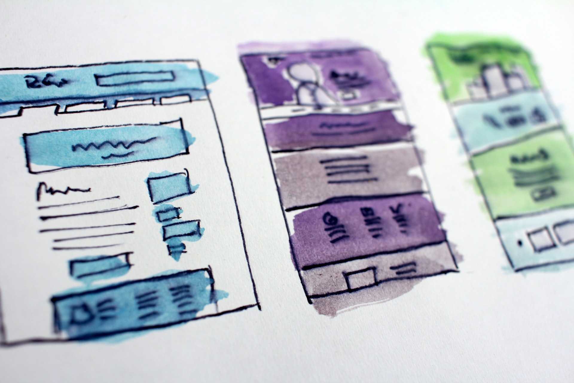 Watercolor and ink website wireframe drawins.