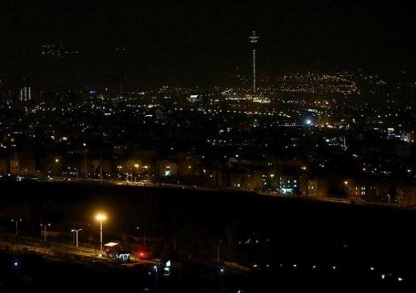 The skyline of Tehran is blacked out.