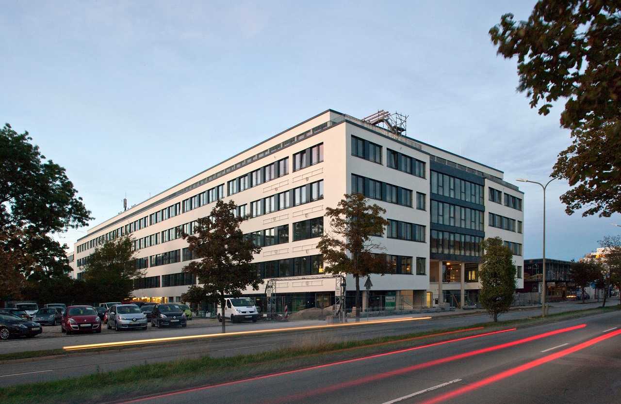 The Connex building in Munich, a four-story modern office block.