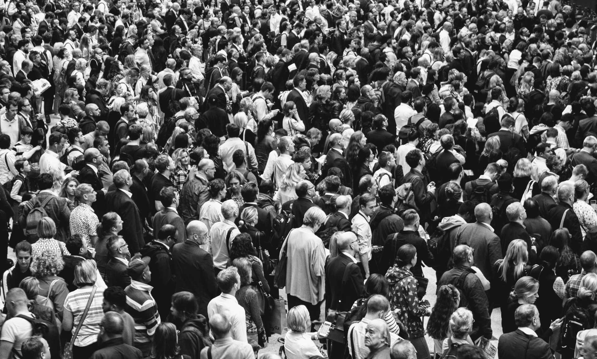 A black and white photo of a large crowd.
