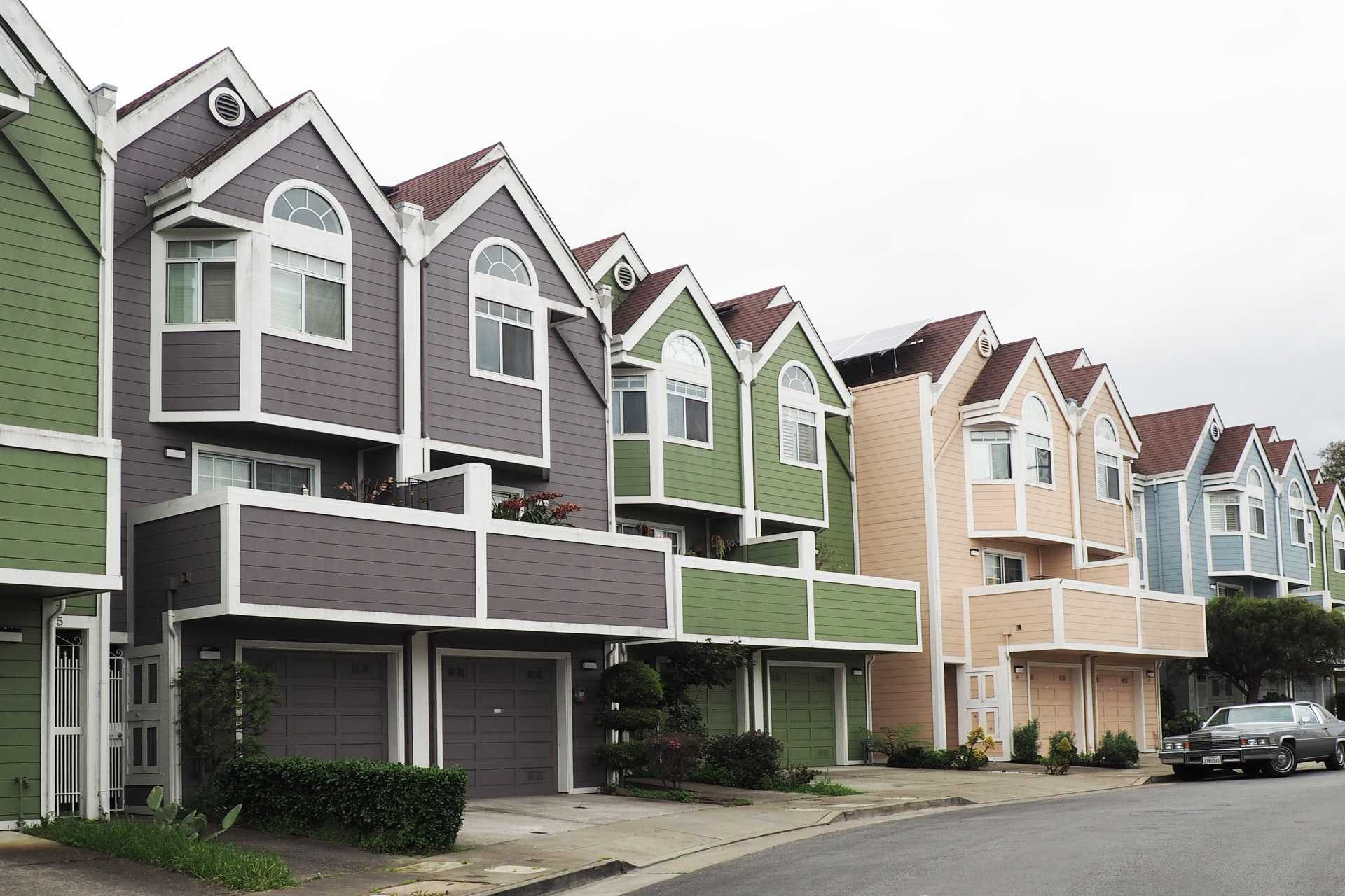 A row of new townhomes with garages in San Francisco.