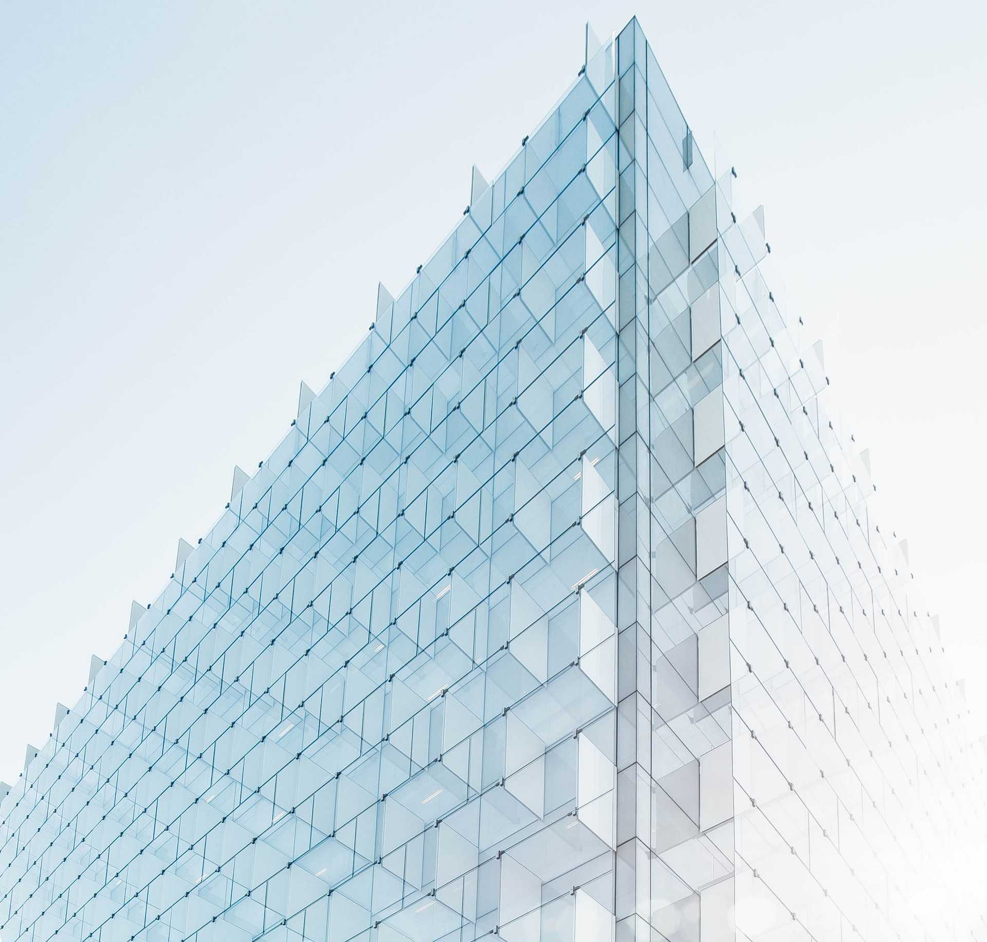 A building facade made of intricate glass panels.